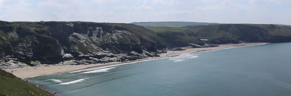 a view of a beach from a hill