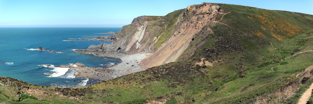 a view of the ocean from the top of a mountain