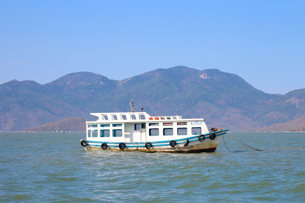 a boat floating on top of a large body of water