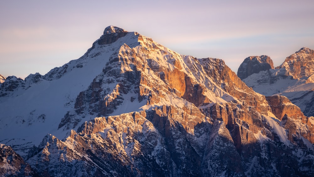 a very tall mountain with a lot of snow on it