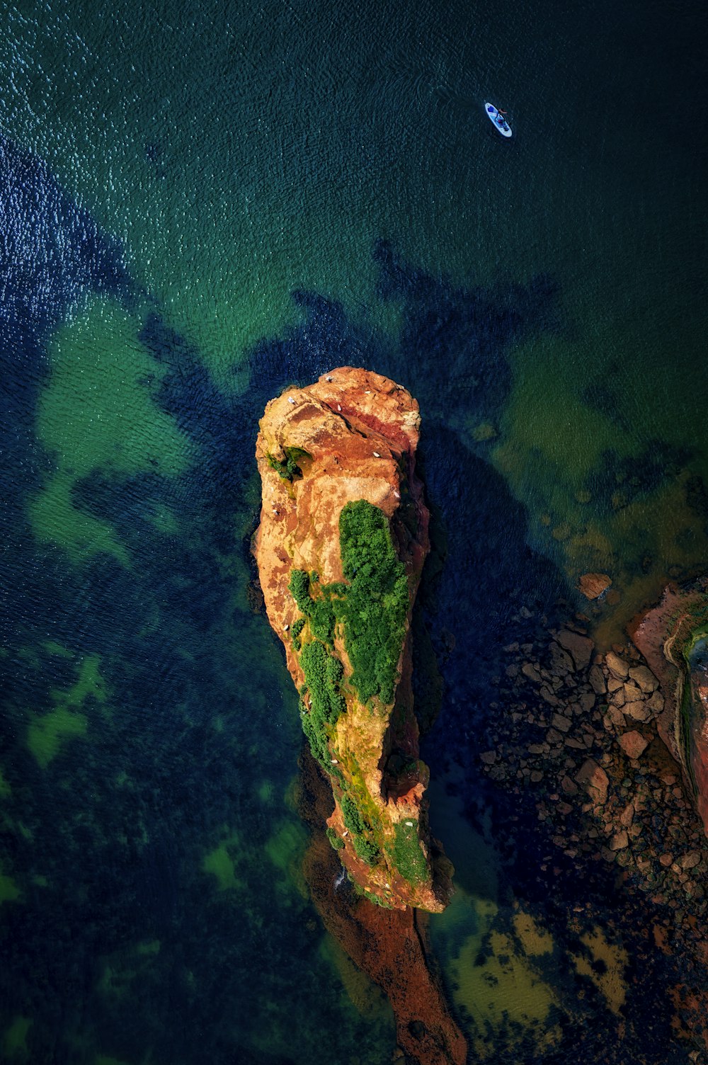 a boat floating on top of a body of water