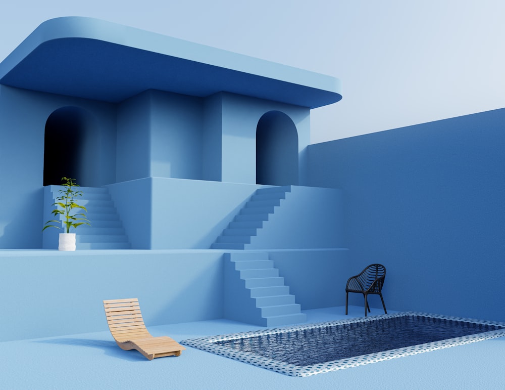 une chambre bleue avec une chaise et des escaliers