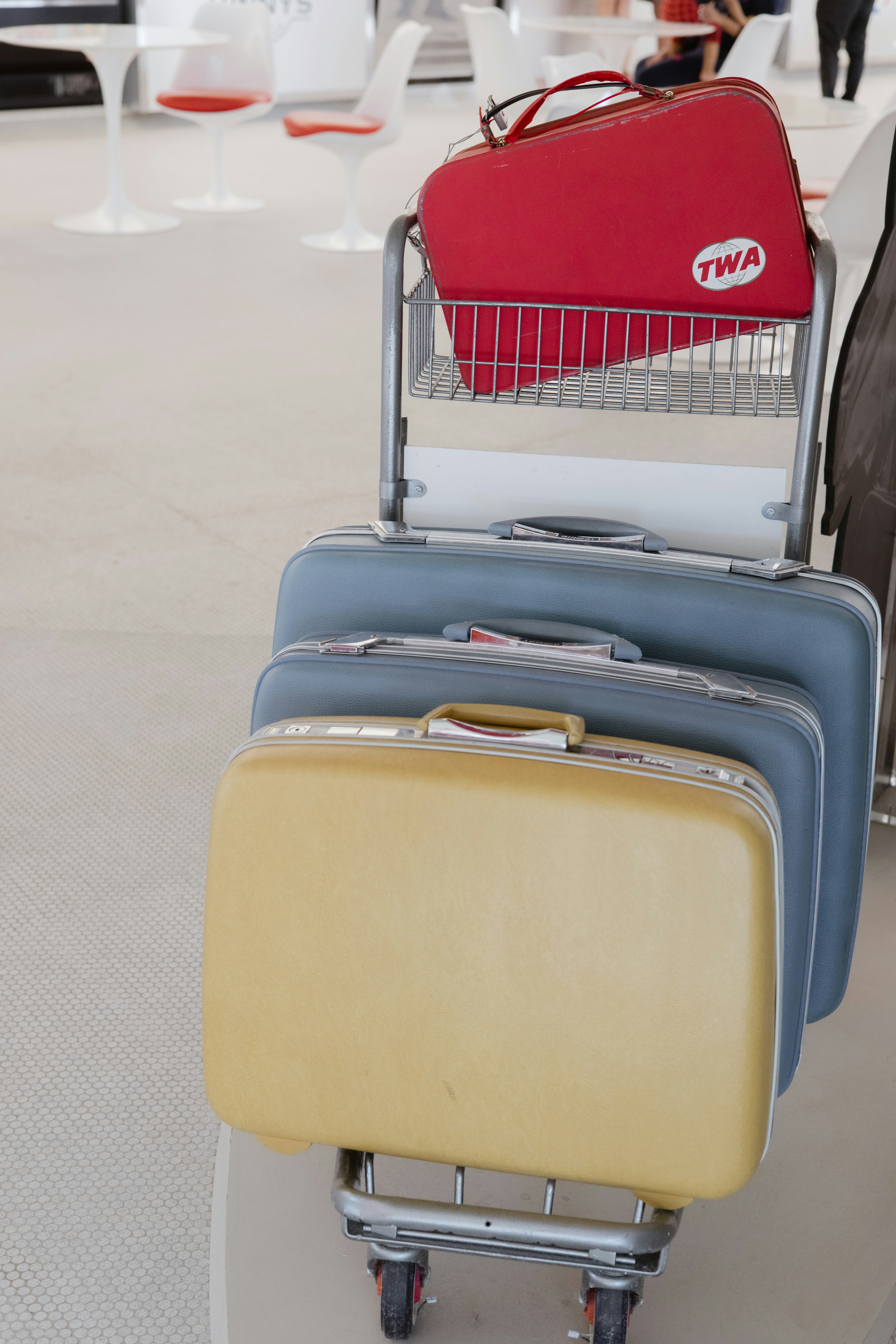 three suitcases stacked on top of each other