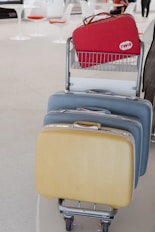 three suitcases stacked on top of each other