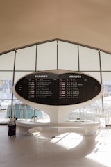 a large sign in the middle of a building