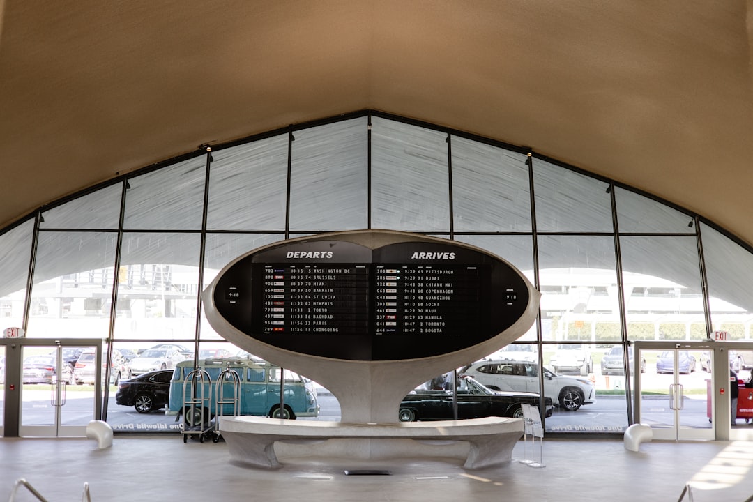 a clock in the middle of a large building,