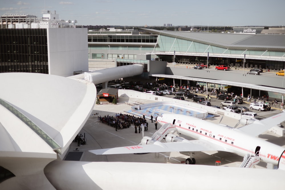 a large jetliner sitting on top of an airport tarmac