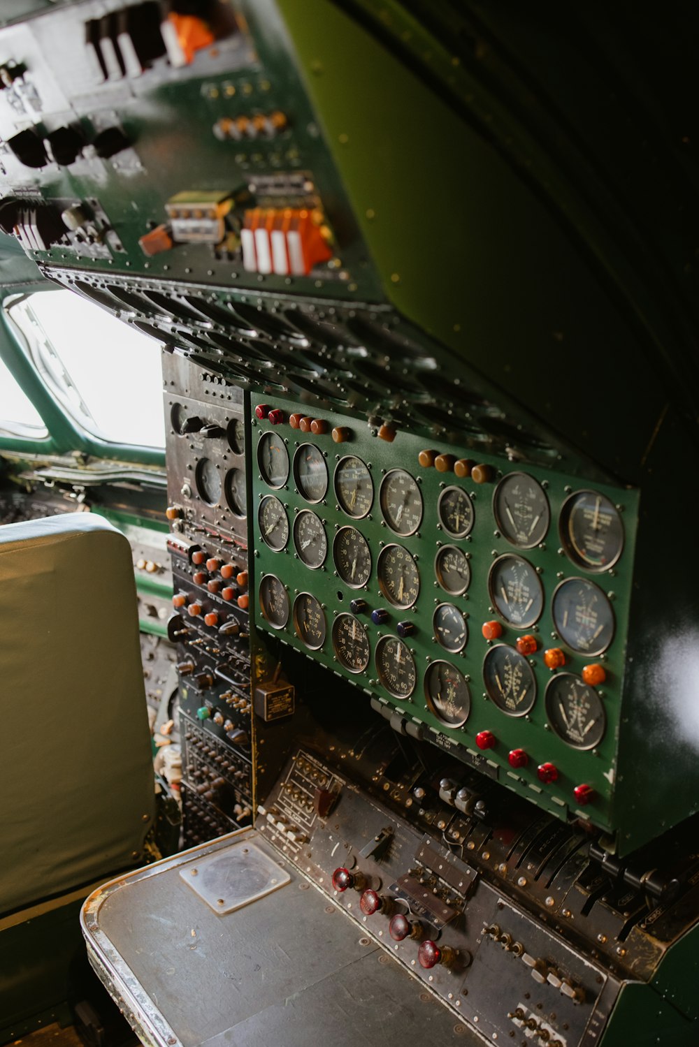 the cockpit of an airplane with many gauges