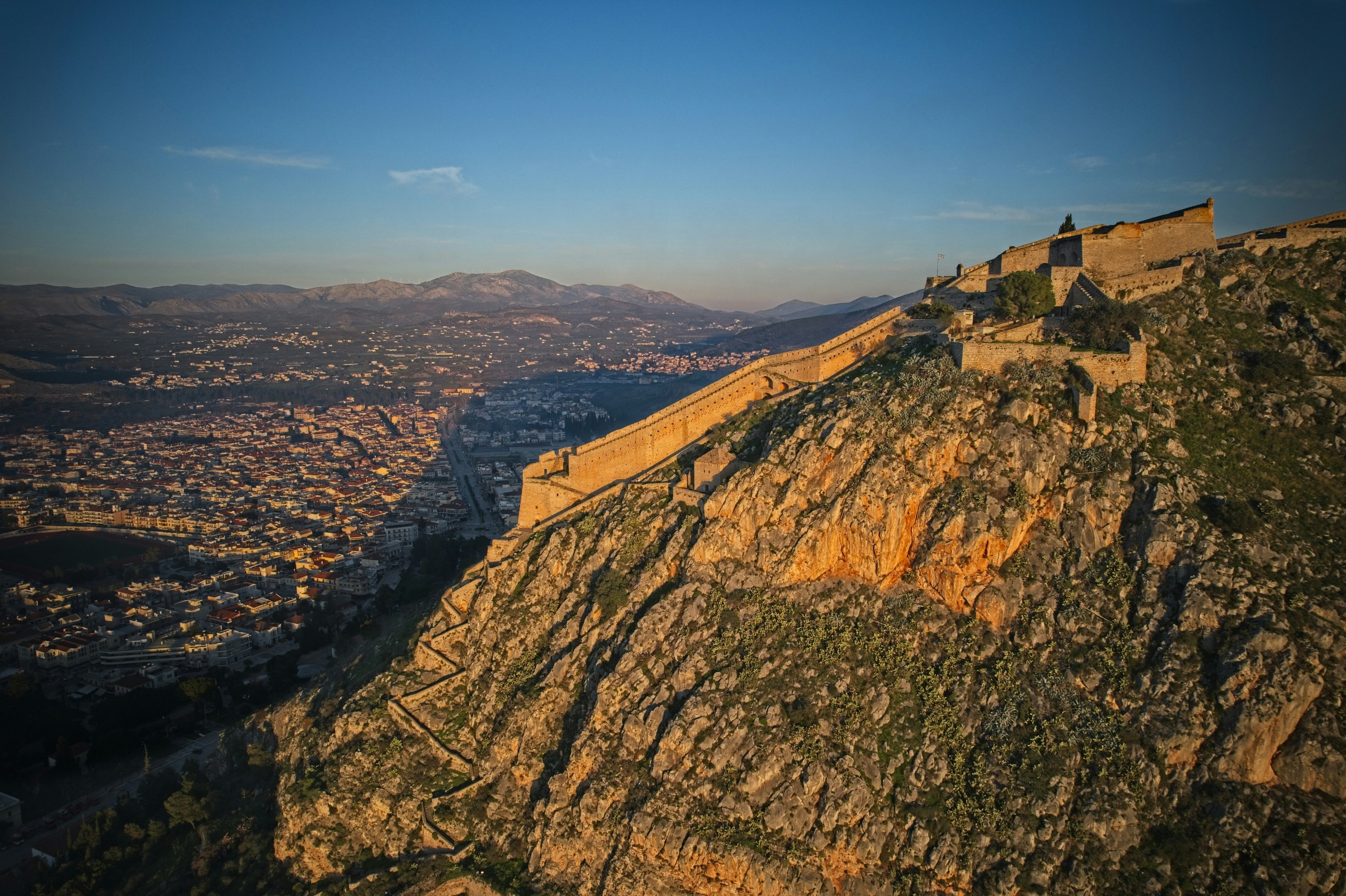 a view of a city from the top of a mountain