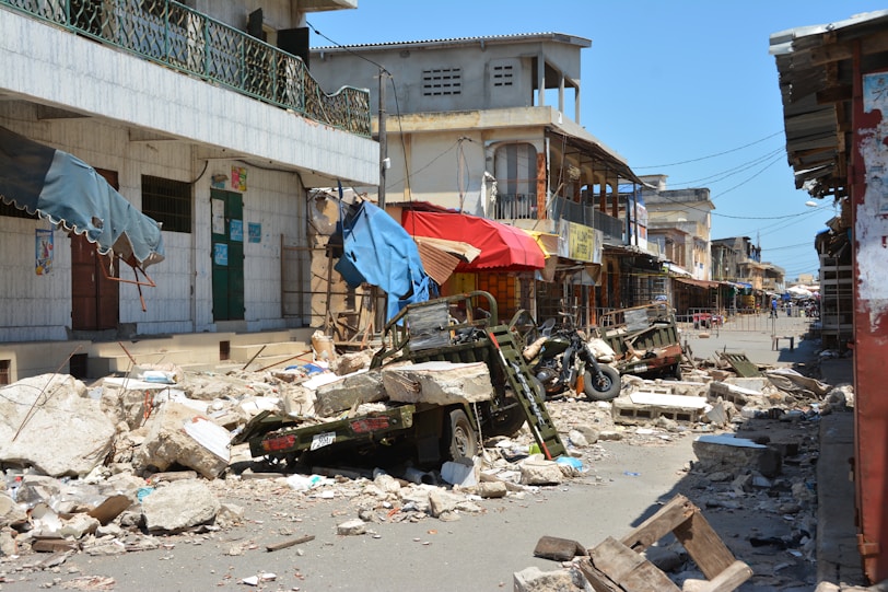 a pile of rubble sitting next to a building