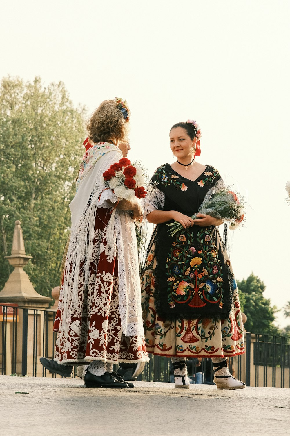 a couple of women standing next to each other