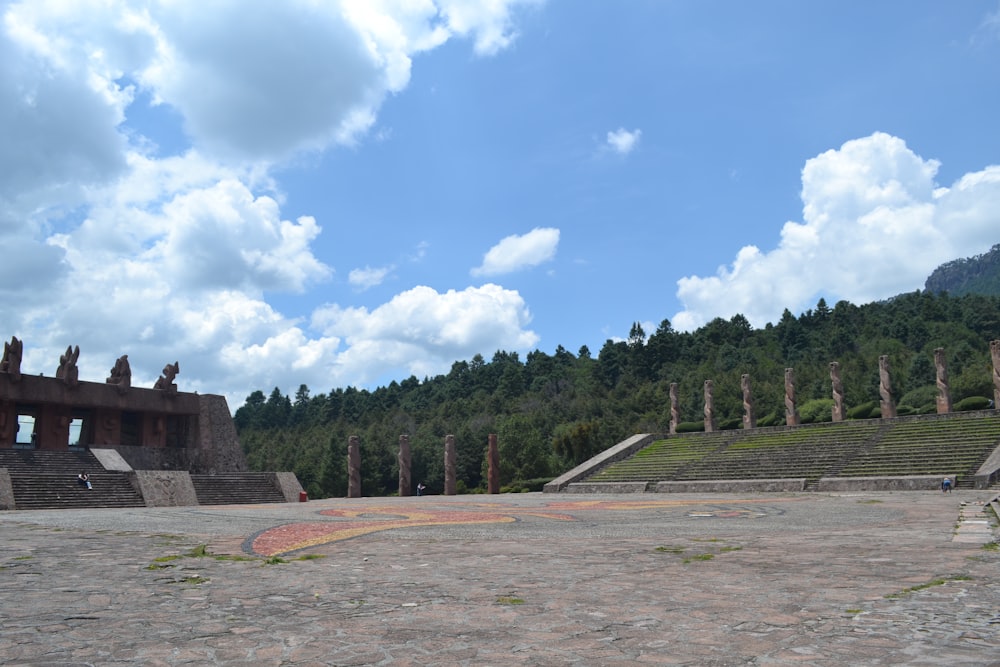 a large open area with a mountain in the background