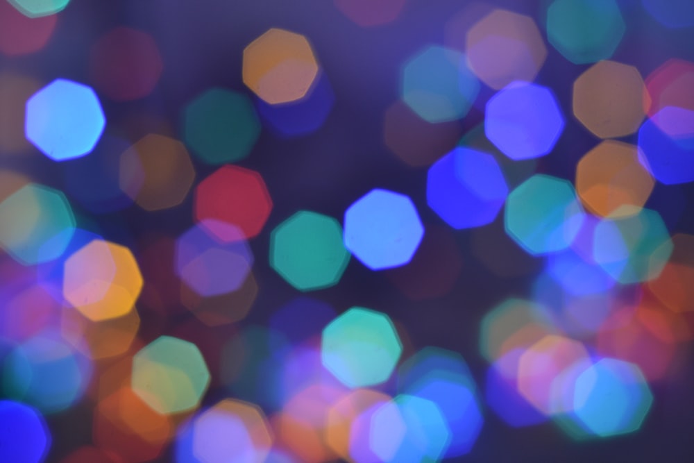 a blurry photo of colorful lights in the dark