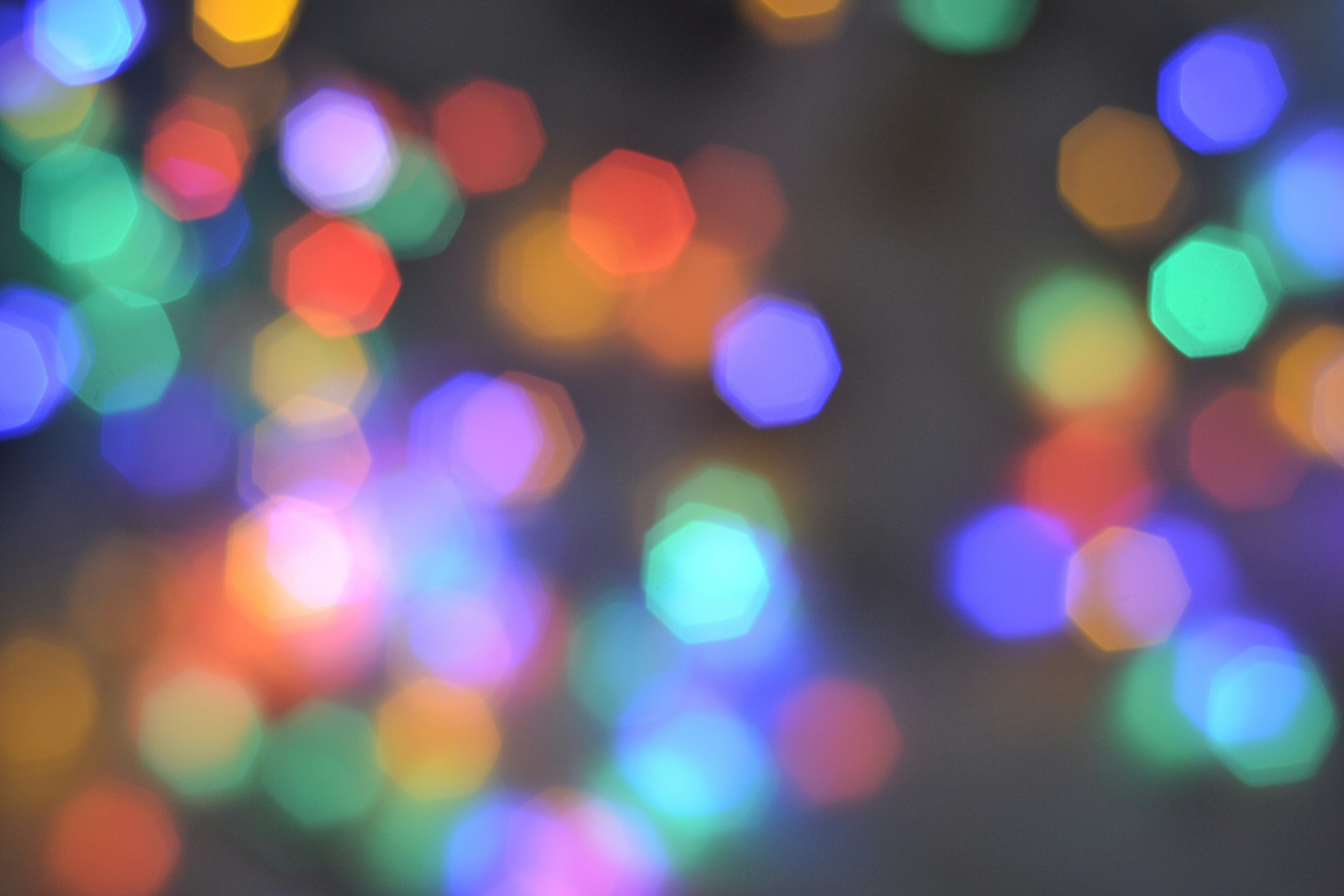 woman wearing yellow long-sleeved dress under white clouds and blue sky during daytime