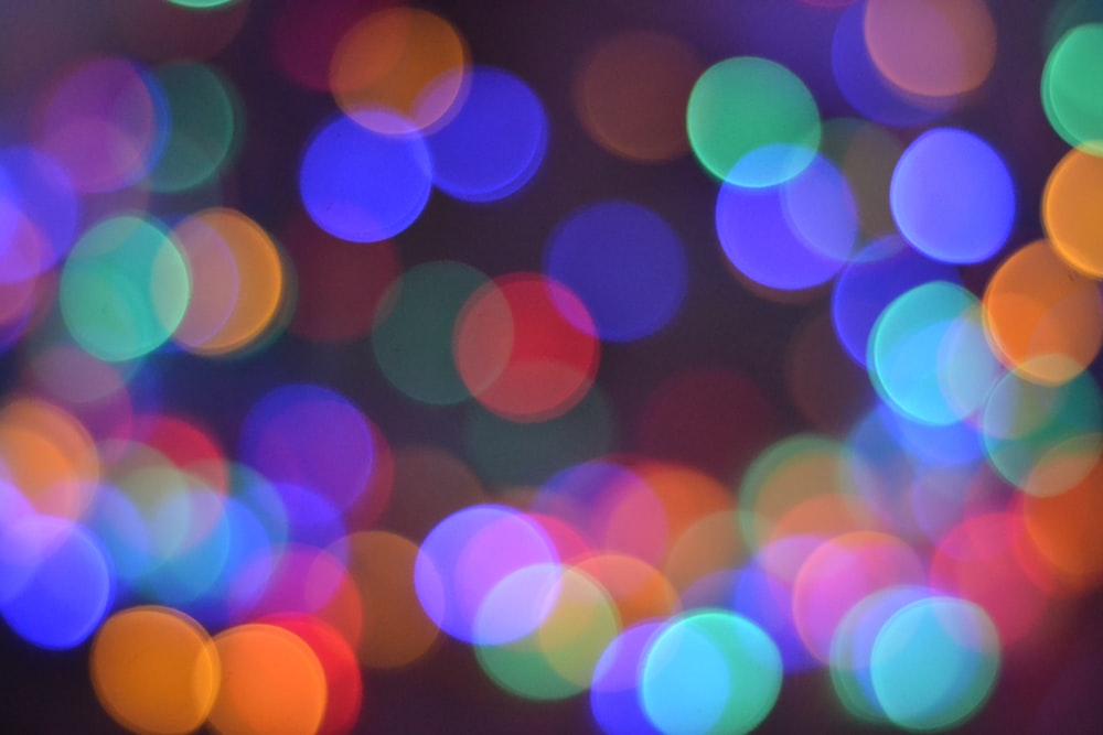 a blurry photo of colorful lights in the dark