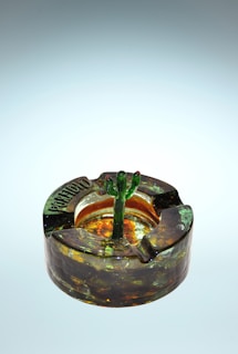 A variety of simple resin ashtrays in different shapes.