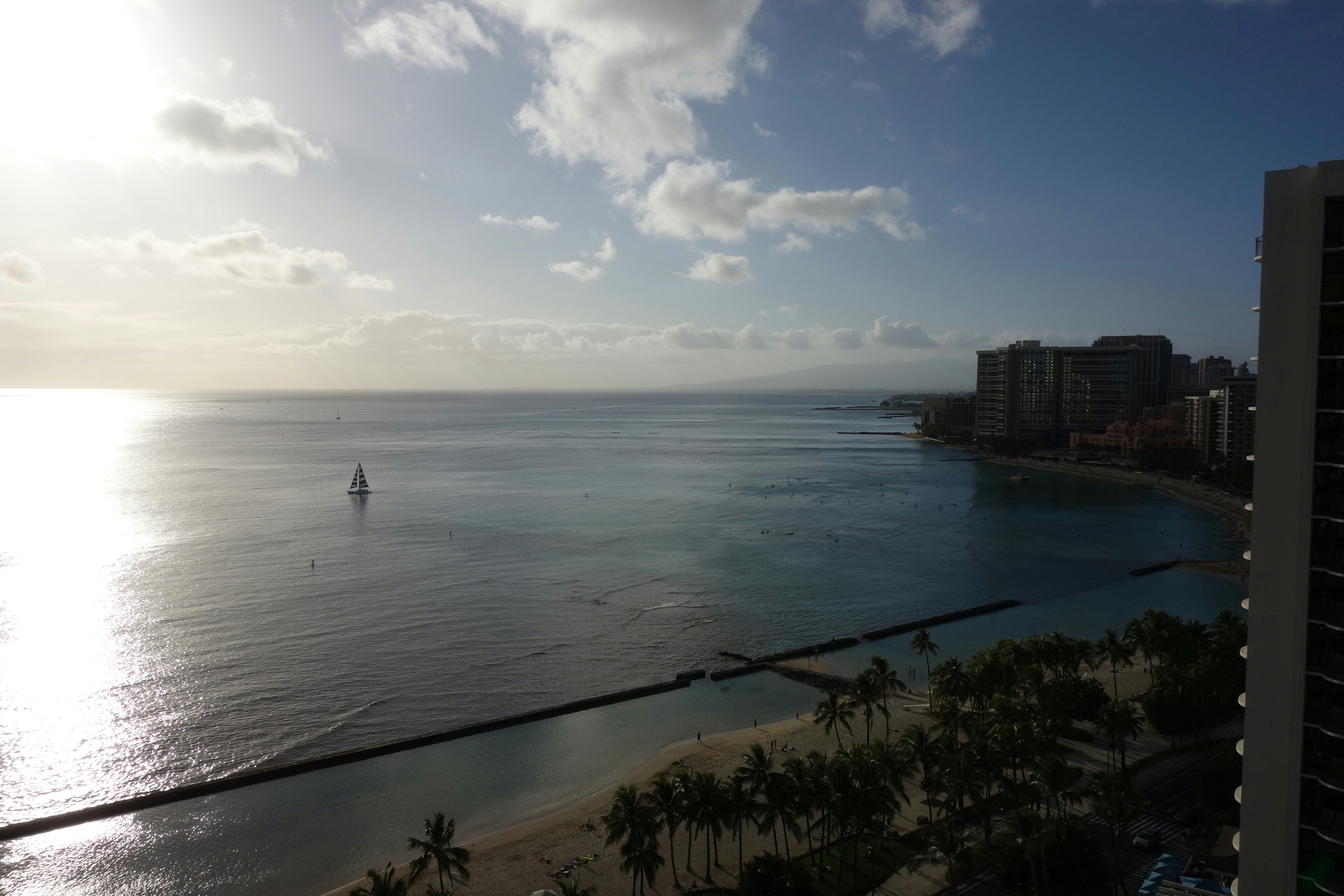a view of the ocean from a high rise building