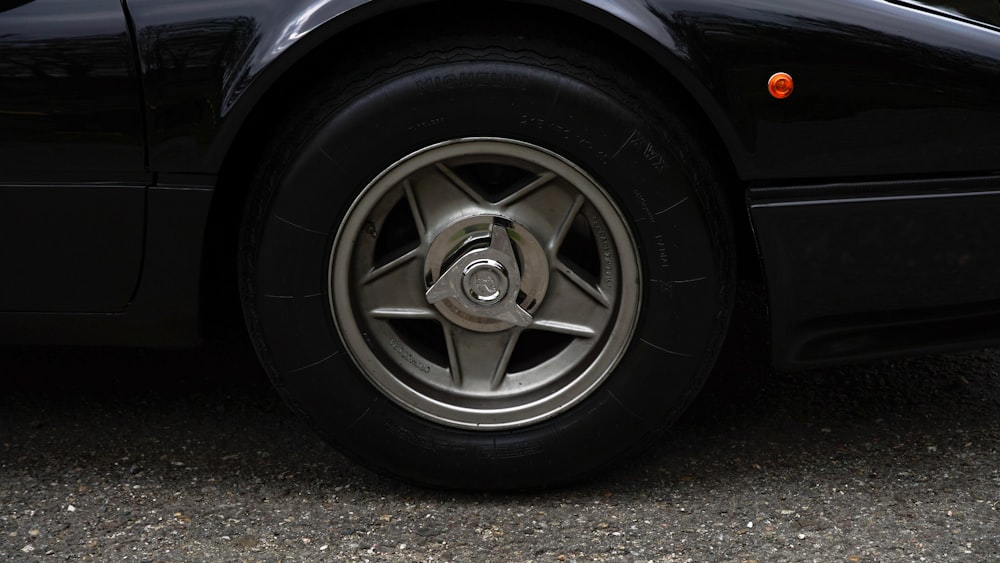 a close up of a tire on a car