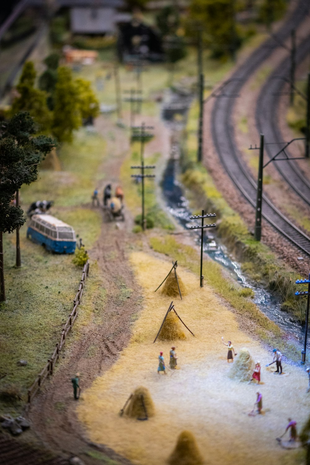 a model of a train track with people on it