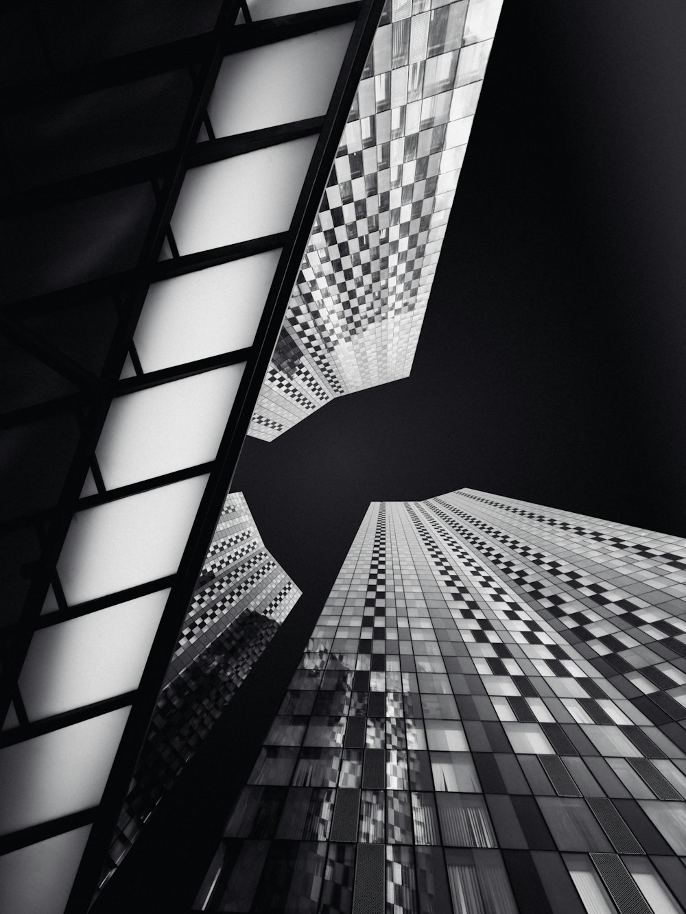 a black and white photo of a tall building