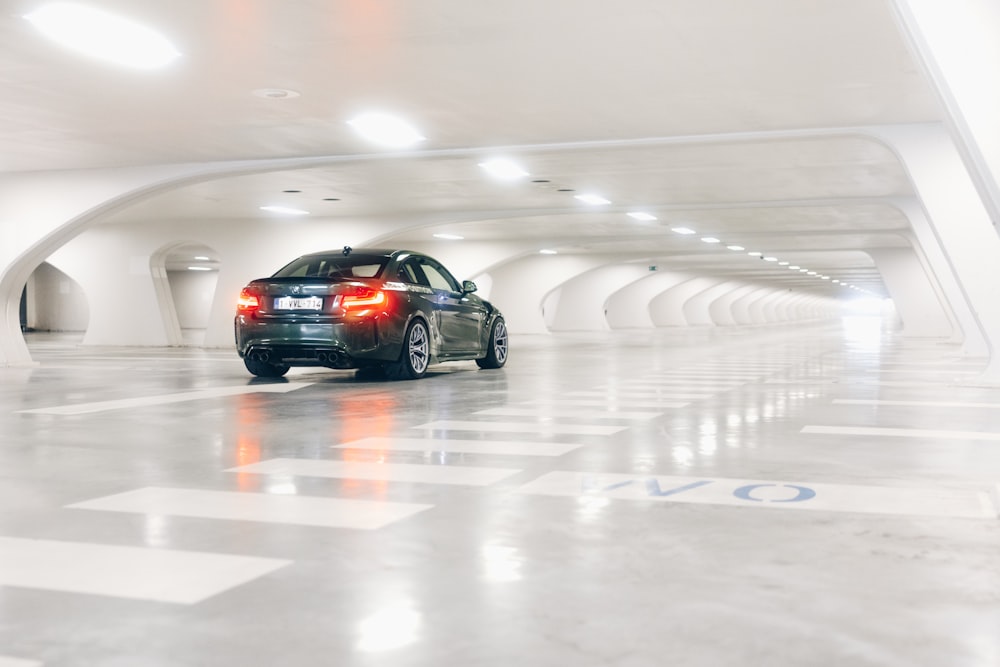 a car is parked in a parking garage