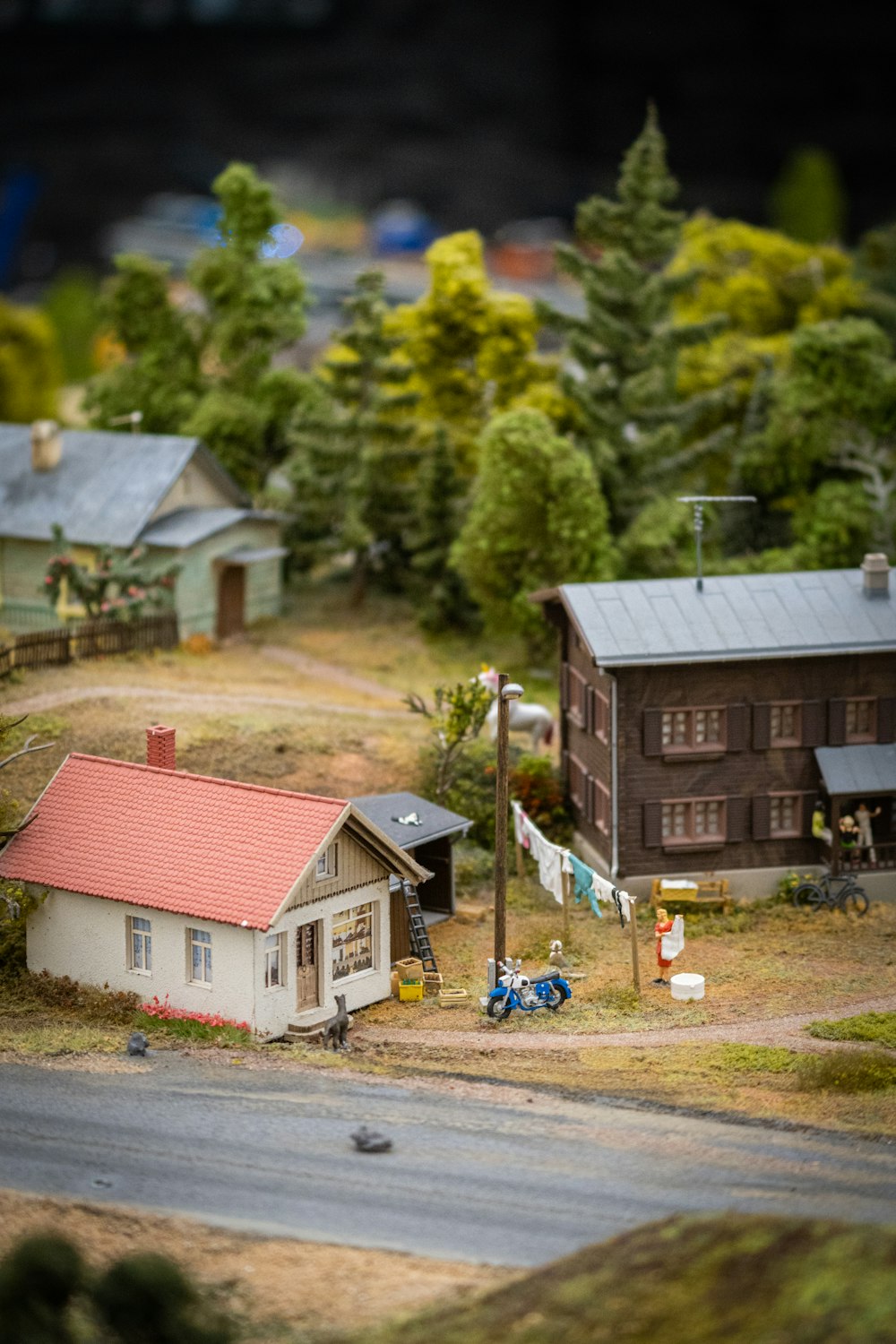 a model of a small town with a red roof