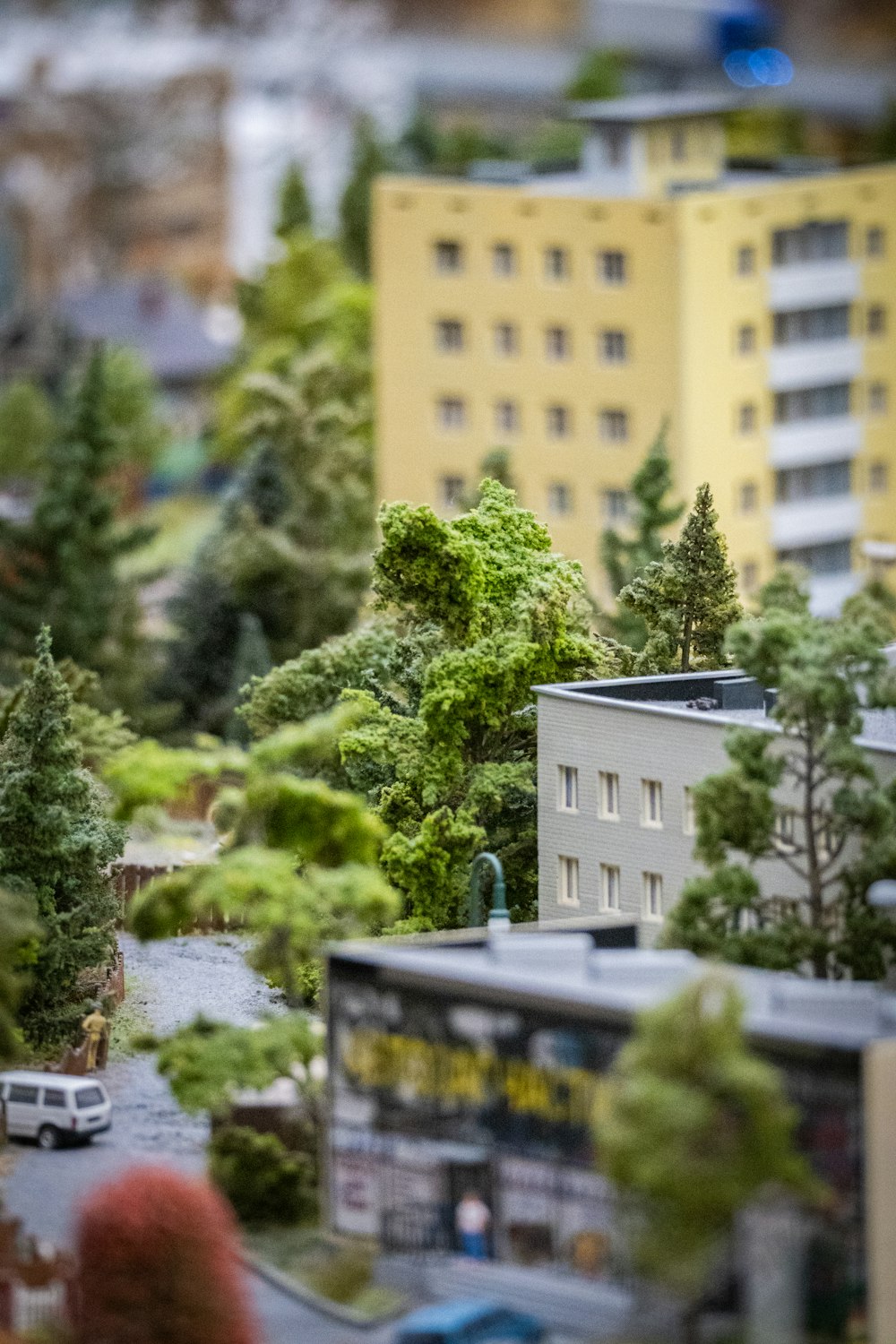 a model of a city with trees and buildings