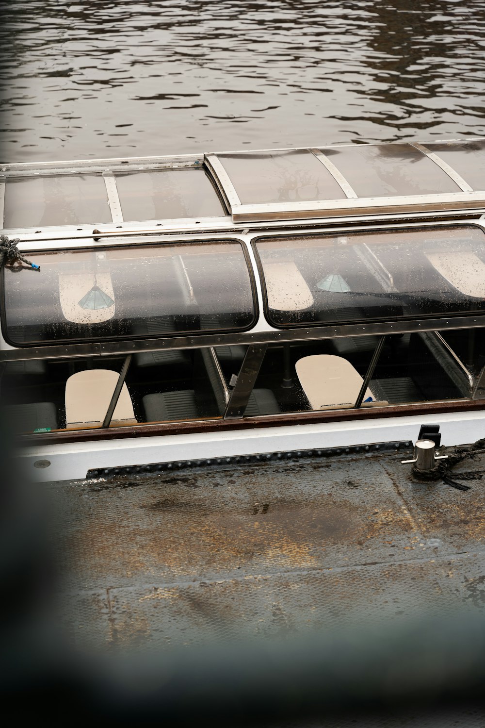 a row of seats sitting on top of a boat