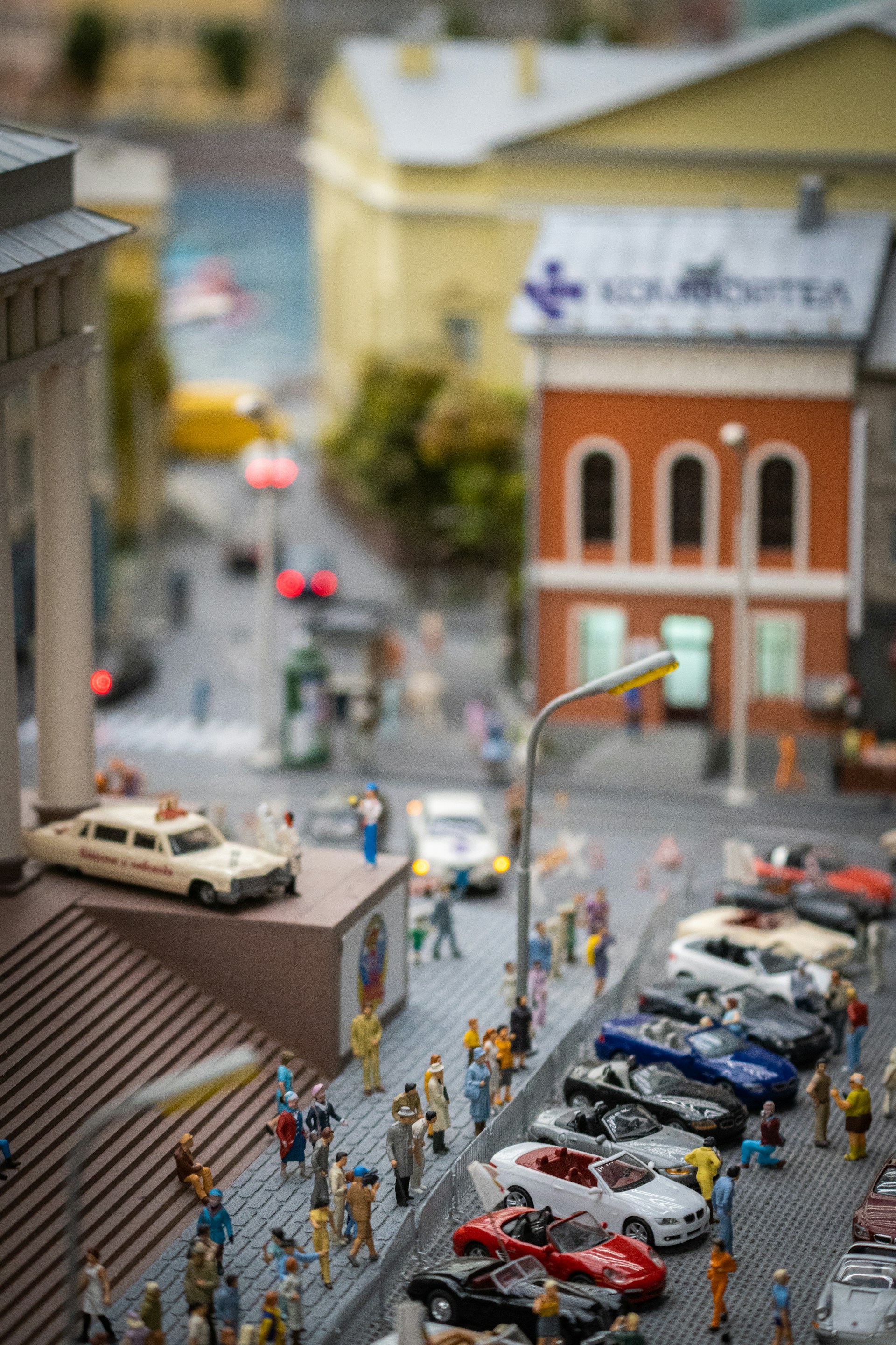 a city street filled with lots of toy cars