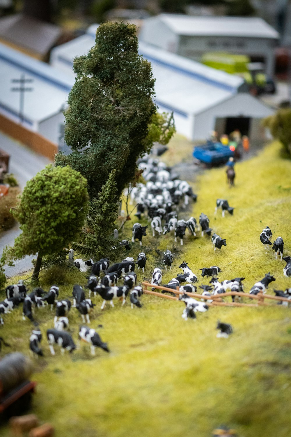 a model of a town with a lot of cows