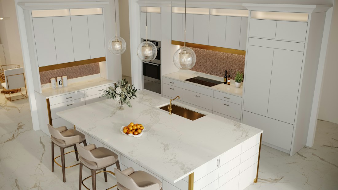 Cozinha com ilha em mármore branco