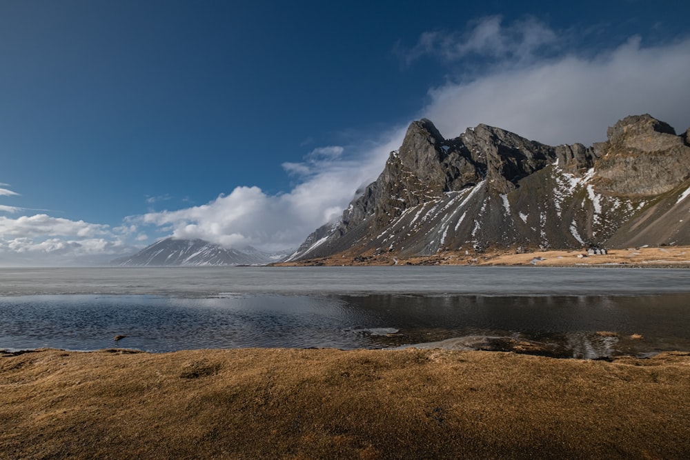 a large body of water surrounded by mountains