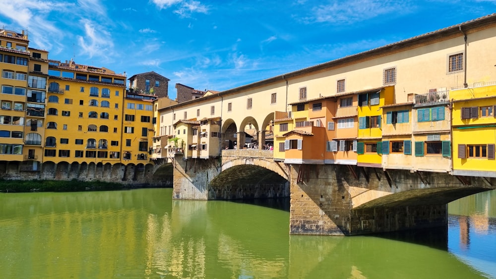 a bridge over a body of water in a city