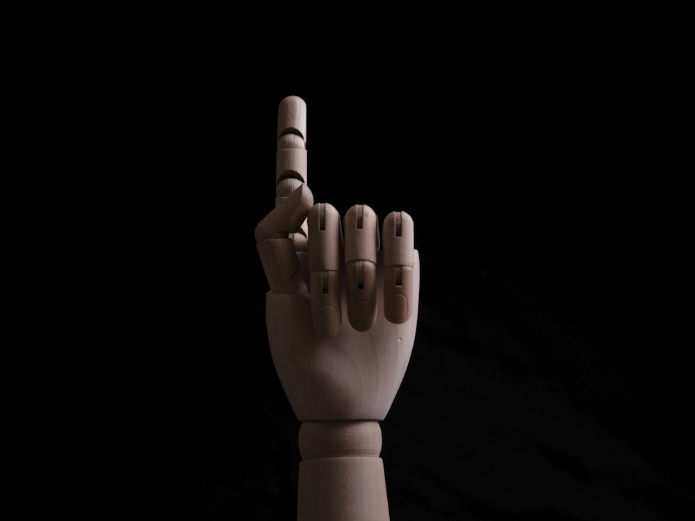 a hand that has two fingers up in the air