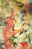 Dynamic mixed media artwork with textured layers and bold colors.