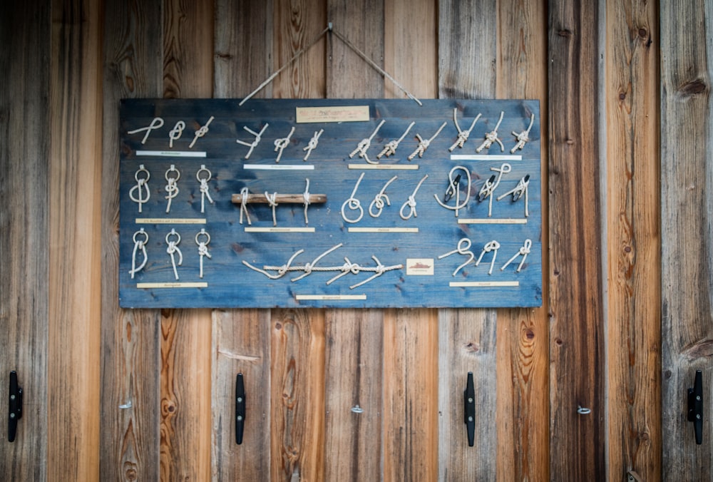 a wooden wall with a sign on it