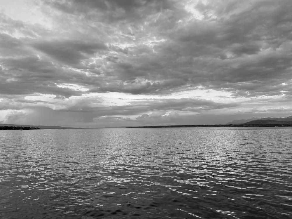 a black and white photo of a body of water