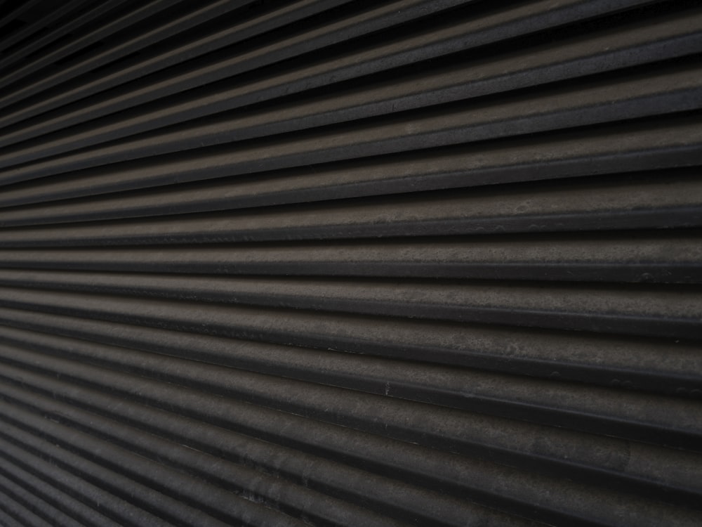 a close up of a black corrugated wall
