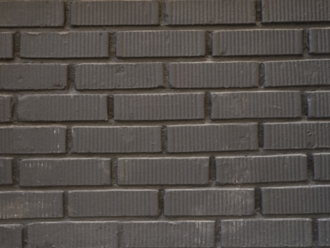 a close up of a brick wall made of bricks