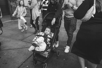 A candid street photo highlighting everyday life and interactions in a local neighborhood.