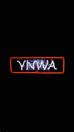 A neon sign with the letters 'YNWA' in glowing white, enclosed in a red rectangular outline, set against a black background.