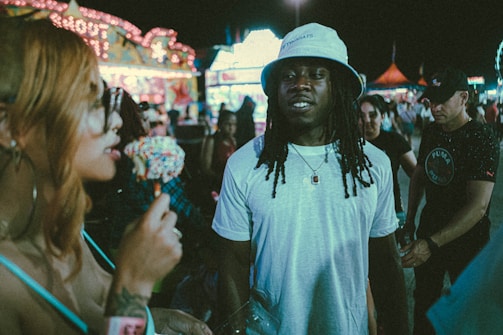 A lively group of friends celebrating together at the carnival.
