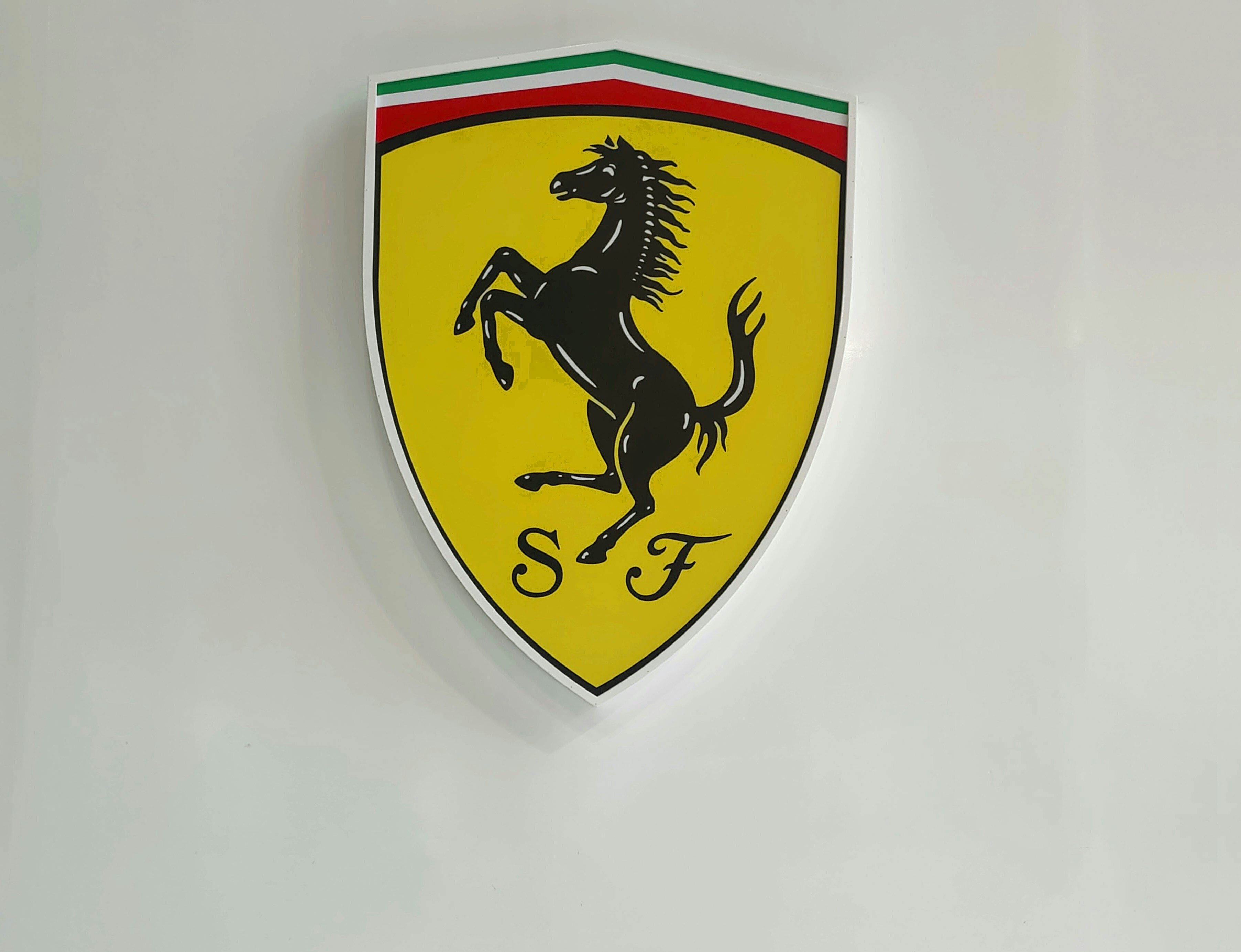 Ferrari prancing horse logo symbolizing Italian passion and racing excellence