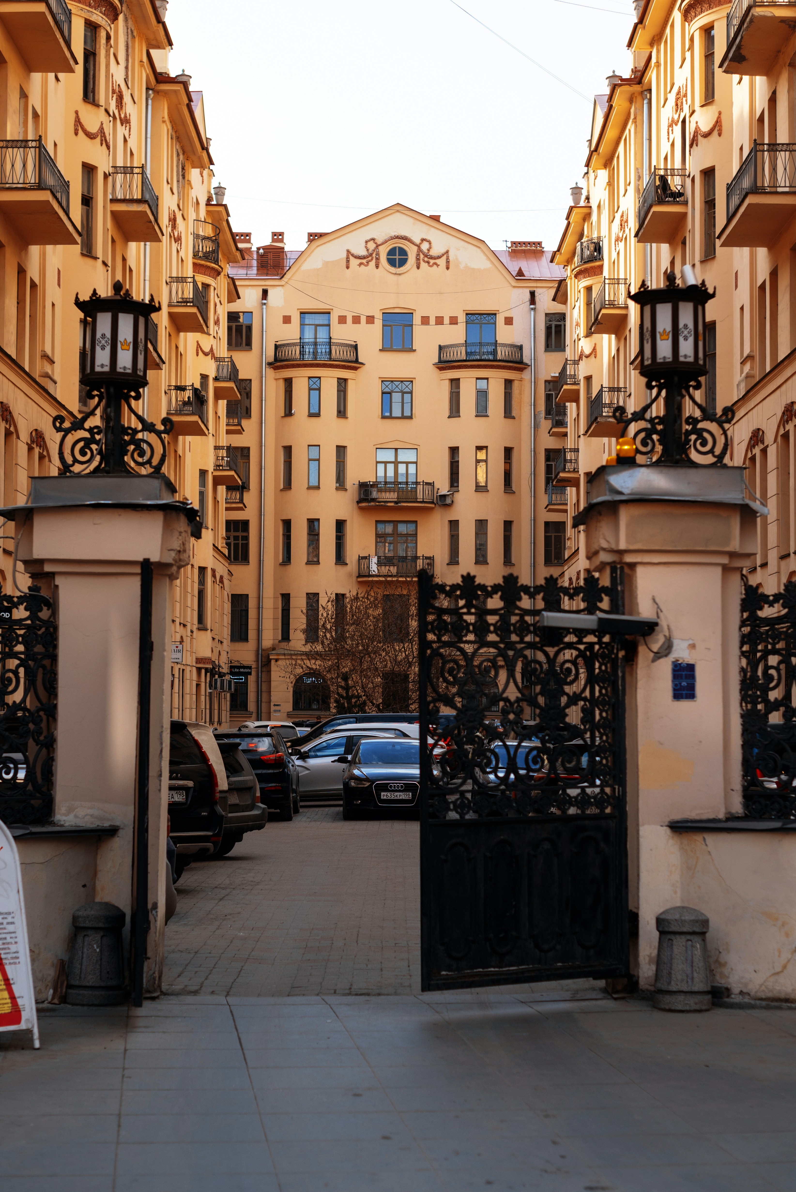 A city street with cars parked on both sides of it photo – Free Saint ...