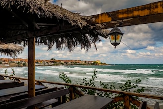 a view of the ocean from a restaurant on the beach