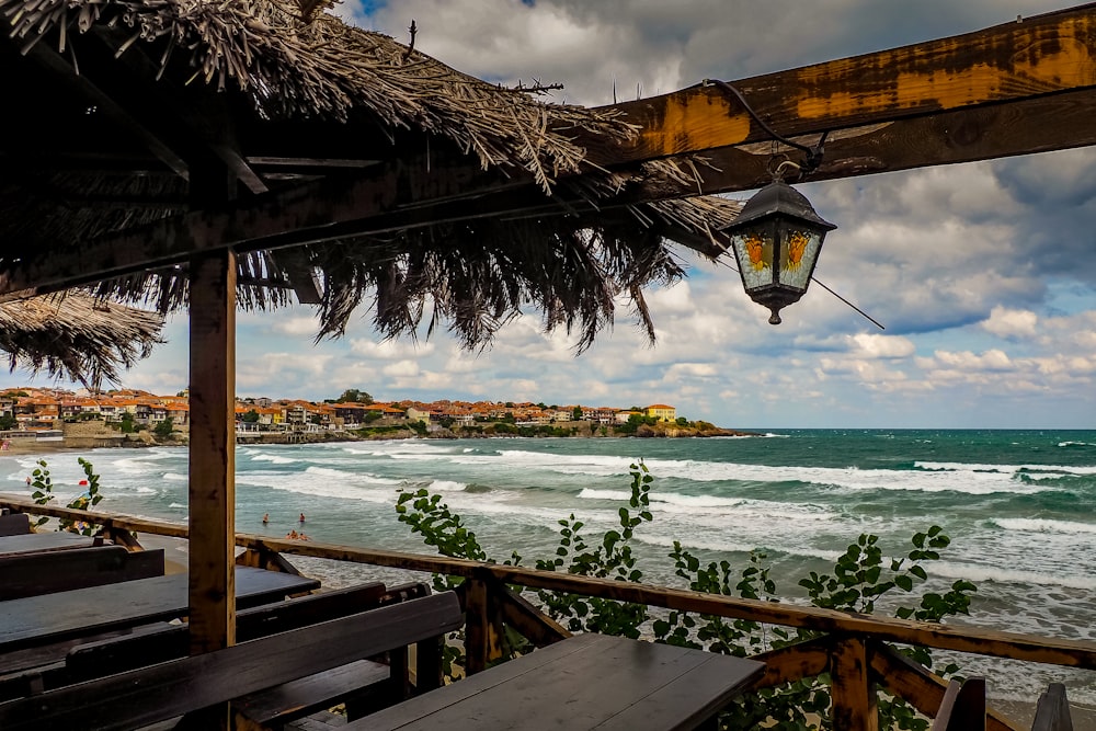 a view of the ocean from a restaurant on the beach