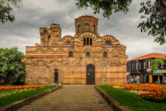 a large brick building with a clock tower on top of it