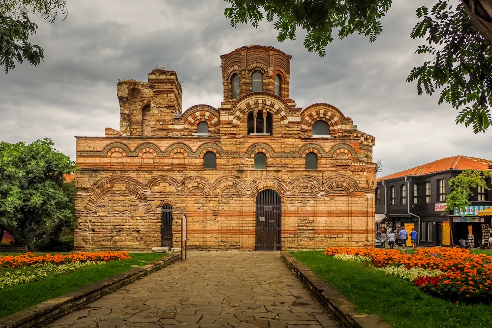 a large brick building with a clock tower on top of it