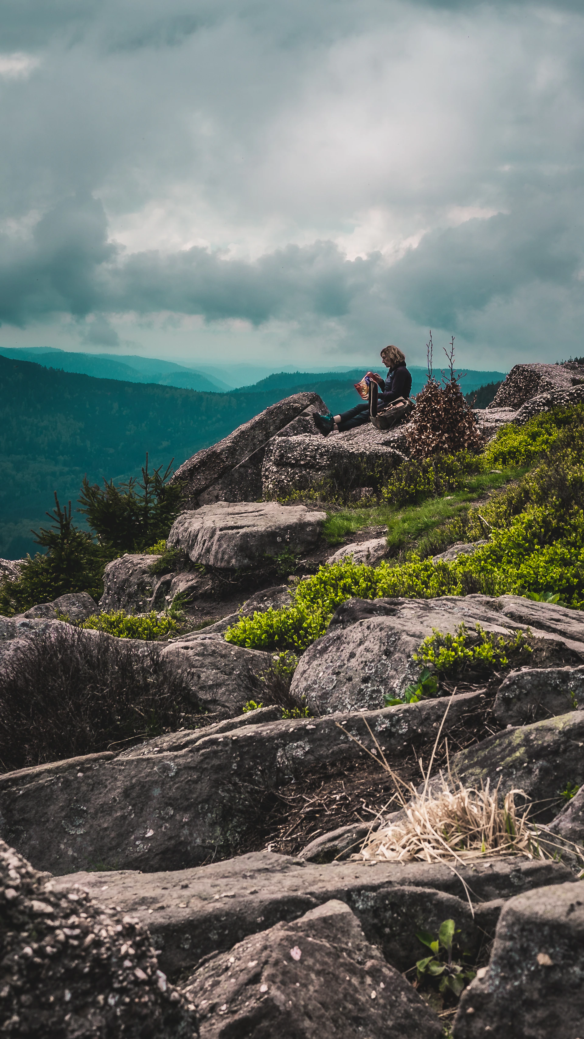 woman wearing yellow long-sleeved dress under white clouds and blue sky during daytime