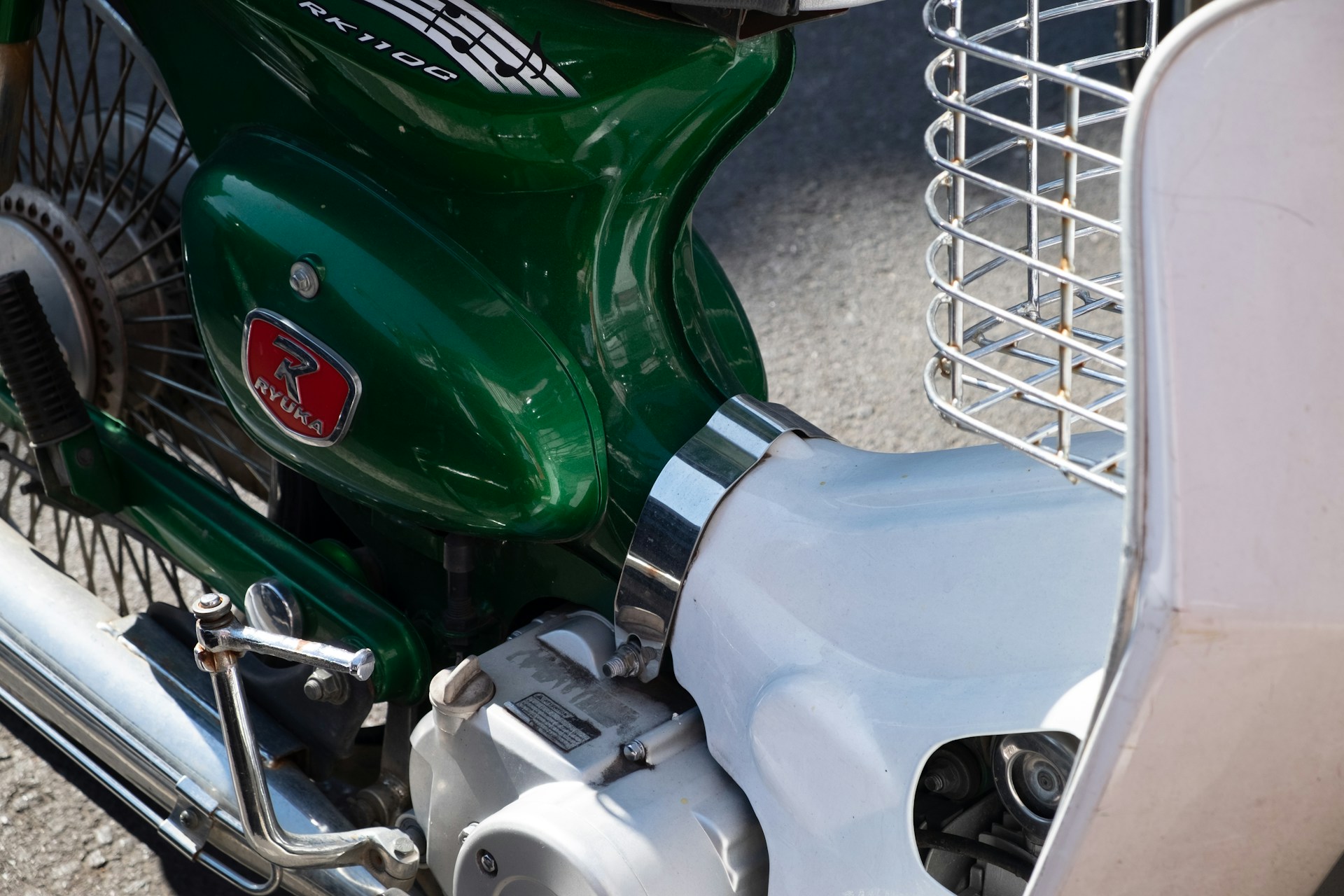Before and after shots side by side showing a vintage bike restored to pristine condition with fresh paint and chrome details